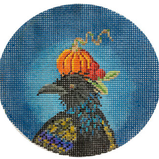 Circular mosaic illustration of a crow wearing a small orange pumpkin hat against a blue background