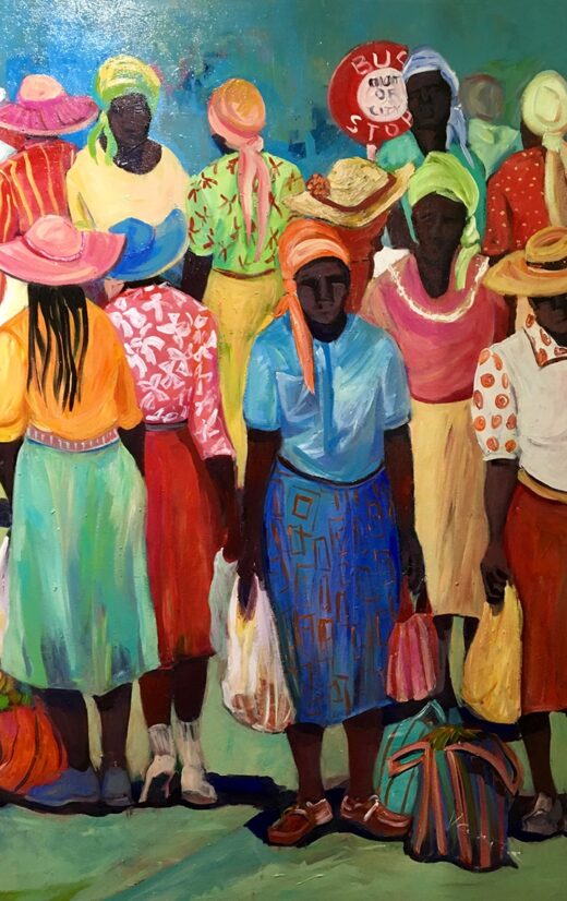 Group of dark-skinned women in bright clothing and hats standing together outdoors, carrying bags.
