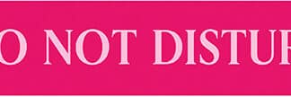 'Do Not Disturb' sign with white text on a hot pink background
